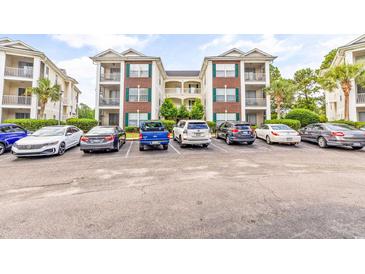 Brick building exterior with multiple levels and balconies at 472 River Oaks Dr. # 65C, Myrtle Beach, SC 29579