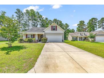 Single-Gathering home with driveway and landscaped yard at 2009 Spring Valley Ct., Loris, SC 29569