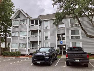 Two-story building exterior with parking in front at 351 Lake Arrowhead Rd. # 20-179, Myrtle Beach, SC 29572