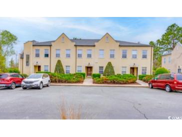 Front view of three-unit townhouse building at 4508-E Ailsa Ct. # 4508-E, Myrtle Beach, SC 29579