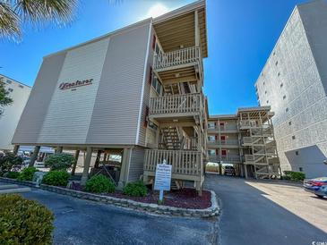 Seafarer Condos exterior view, showing building and parking at 4305 S Ocean Blvd. # 106, North Myrtle Beach, SC 29582