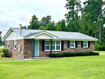 Photo one of 110 West Marion St. Johnsonville SC 29555 | MLS 2419527