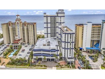 Aerial view of oceanfront resort, parking and landscaping at 5308 N Ocean Blvd. # 812, Myrtle Beach, SC 29577