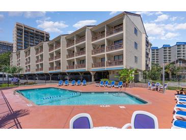 Resort-style pool with plenty of seating at 202 75Th Ave N # 5706/5707, Myrtle Beach, SC 29572