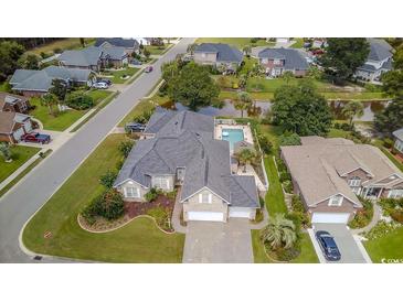 Aerial view of home with pool and landscaped yard at 3412 Westminster Dr., Myrtle Beach, SC 29588