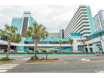 Landmark high-rise building with teal accents and palm trees at 1501 S Ocean Blvd. # 429, Myrtle Beach, SC 29577