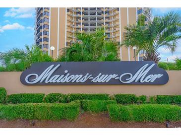 Maisons-sur-Mer building signage with landscaping at 9650 Shore Dr. # 902, Myrtle Beach, SC 29572
