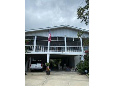 Elevated beach home with screened porch and parking at 334 Norris Dr., Pawleys Island, SC 29585