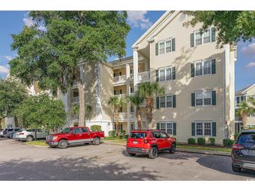 Three-story residential building with ample parking at 601 Hillside Dr. N # 3906, North Myrtle Beach, SC 29582