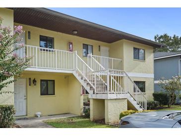 Two-story building with stairs and balconies at 1301 Pridgen Rd. # 1008, Myrtle Beach, SC 29577