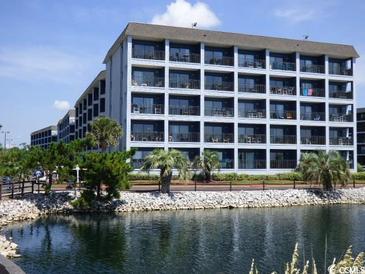 Multi-story building with waterfront views at 5905 S Kings Highway # 219-B, Myrtle Beach, SC 29575