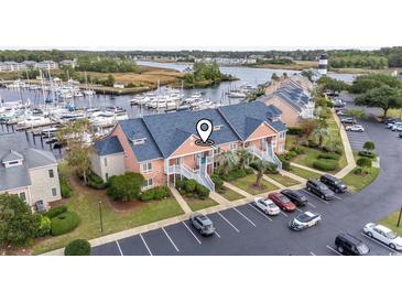 Waterfront property with marina and parking at 4755 Lightkeepers Way # 15-F, Little River, SC 29566