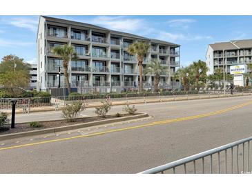 Exterior view of a building, possibly a condo building with ocean views at 2000 Ocean Blvd. S # 306, Myrtle Beach, SC 29577