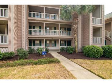 Attractive building exterior with landscaping at 366 Pinehurst Ln. # 13D, Pawleys Island, SC 29585