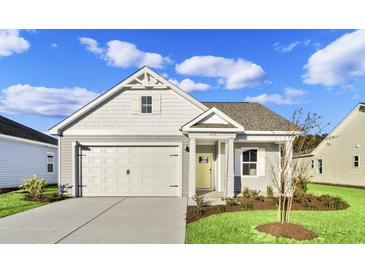 Craftsman style home with attached garage and landscaped lawn at 3030 Deerberry Place, Longs, SC 29568