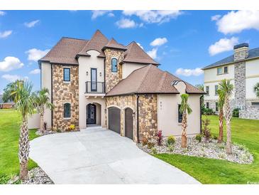 Luxury two-story home with stone accents at 891 Waterton Ave., Myrtle Beach, SC 29579