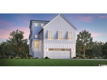 Two story home with gray siding and white trim at 512 9Th Ave. S, North Myrtle Beach, SC 29582