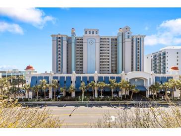 Oceanfront resort building with parking and palm trees at 2301 Ocean Blvd. S # 1218, Myrtle Beach, SC 29577