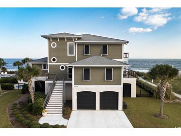 Oceanfront home with two-car garage and spacious deck at 2209 S Waccamaw Dr., Murrells Inlet, SC 29576