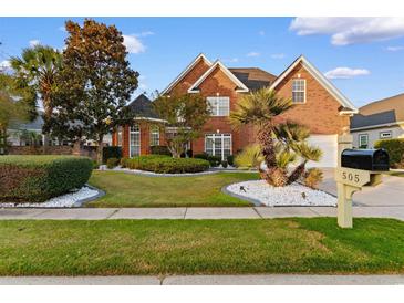 Brick house with landscaping, driveway and mailbox at 505 Quincy Hall Dr., Myrtle Beach, SC 29579