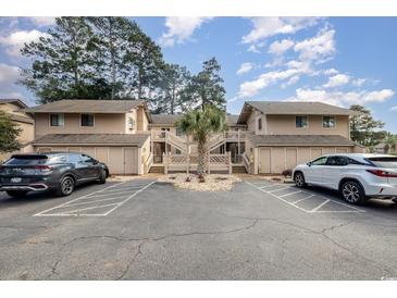Two-story building with parking and landscaping at 3015 Old Bryan Dr. # 4-8, Myrtle Beach, SC 29577