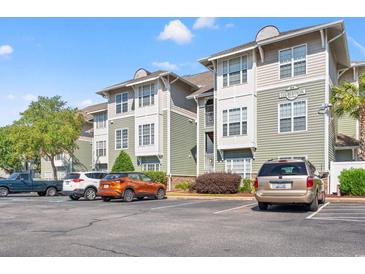 Exterior of Culbertson building with parking lot at 84 S Addison Cottage Way # 213, Murrells Inlet, SC 29576