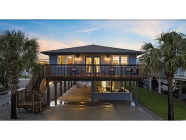 Elevated home with deck and stairs at 3801 N Ocean Blvd., North Myrtle Beach, SC 29582