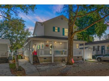 Two-story home with front porch and walkway at 6001-7038 S Kings Hwy., Myrtle Beach, SC 29575