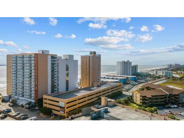 Aerial view of oceanfront property and surrounding buildings at 9550 Shore Dr. # 1202, Myrtle Beach, SC 29572
