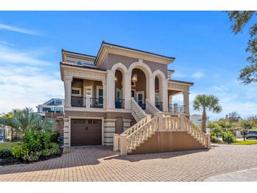 Stunning two-story home with a grand entrance and attached garage at 8810 N Ocean Blvd., Myrtle Beach, SC 29572