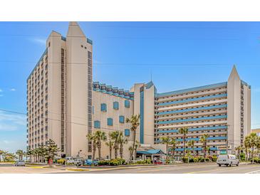 Ocean Reef Resort, a seaside resort with palm trees and parking at 7100 N Ocean Blvd. # 218, Myrtle Beach, SC 29572