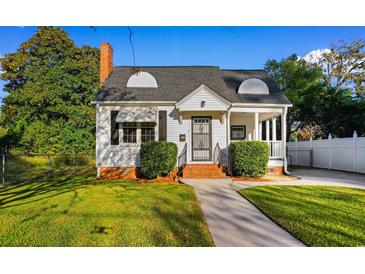 Cozy bungalow with a well-manicured lawn at 432 N Smith Rd., Mullins, SC 29574