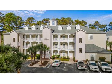 Two-story building with a traditional design at 112 Cypress Point Ct. # 103, Myrtle Beach, SC 29579