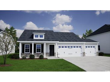Two-story house with a two car garage, stone accents, and a landscaped lawn at 219 Sundrop Way, Conway, SC 29526