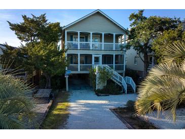 Two story home with a large deck, situated near the water at 241 Atlantic Ave., Pawleys Island, SC 29585