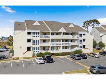 Attractive condo building with ample parking at 1100 Possum Trot Rd. # F-213, North Myrtle Beach, SC 29582