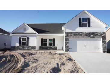 Newly constructed home with stone accents and a two-car garage at 436 Hallie Martin Rd., Conway, SC 29527