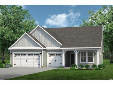 Two-story house with gray siding, white trim, and a two-car garage at 5019 Cambria Ct., Little River, SC 29566