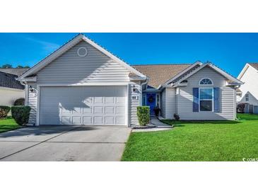 One story home with attached garage, manicured lawn and neutral siding at 160 Somerworth Circle, Surfside Beach, SC 29575