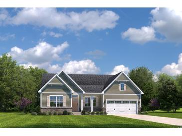 Ranch style home with gray siding, stone accents, and a two-car garage at 7039 Denim Loop, Myrtle Beach, SC 29579