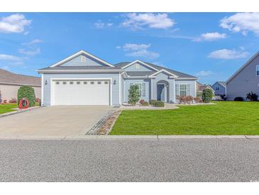 Newly built home with a two-car garage and well-manicured lawn at 360 Hillsborough Dr., Conway, SC 29526