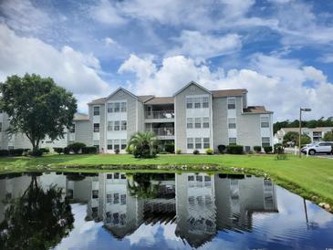 Attractive condo building with pond views at 8649 Southbridge Dr. # B, Surfside Beach, SC 29575