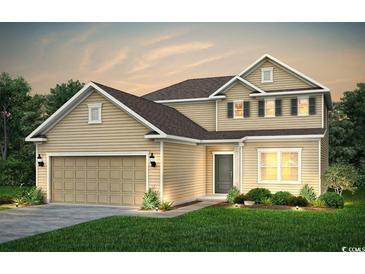 Two-story house with beige siding, gray door, and a two-car garage at 1320 Winding Creek Way, Myrtle Beach, SC 29588