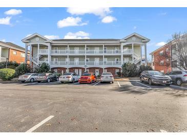 Inviting condo building with ample parking at 3943 Gladiola Ct. # 204, Myrtle Beach, SC 29588