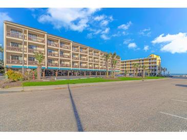 Oceanfront property with two buildings, ample parking, and a beautiful beachfront view at 202 75Th Ave N # 5704/5705, Myrtle Beach, SC 29572