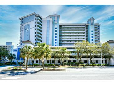 Compass Cove oceanfront resort building exterior, featuring multiple stories and balconies at 2301 S Ocean Blvd. # Ph22, Myrtle Beach, SC 29577