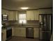 Modern kitchen featuring stainless steel appliances and white cabinets at 209 A/B 26Th Ave. S, Myrtle Beach, SC 29577