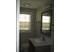 Clean bathroom with a single sink vanity and a large mirror at 209 A/B 26Th Ave. S, Myrtle Beach, SC 29577