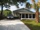A charming single-story home with a spacious driveway and lush landscaping at 209 A/B 26Th Ave. S, Myrtle Beach, SC 29577