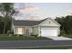 Two-car garage and a charming ranch-style house at Tbd1 Kapalua Loop, Little River, SC 29566